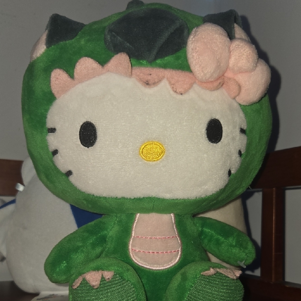 Sanrio Hello Kitty Green Dinosaur Plush with Pink Bow